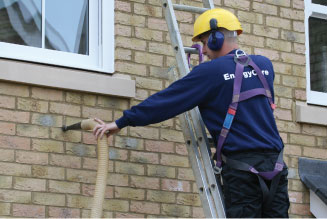 EnergyCare installer fitting Cavity Wall Insulation